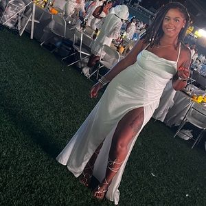 All white with pearl beads floor length dress with split.